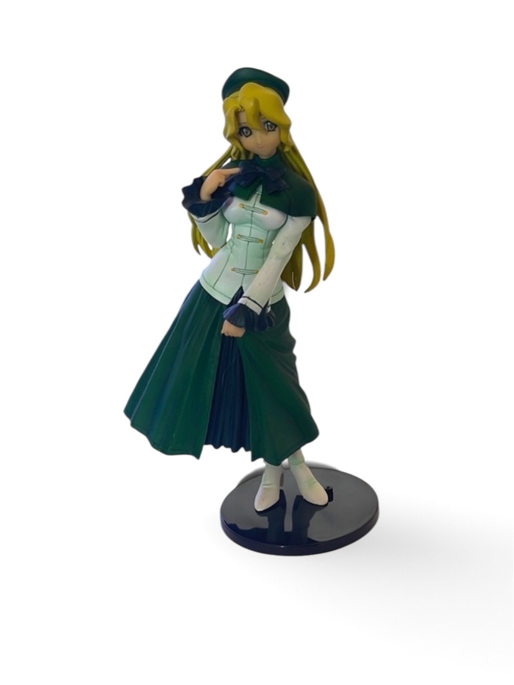 Green and White Anime Figurine